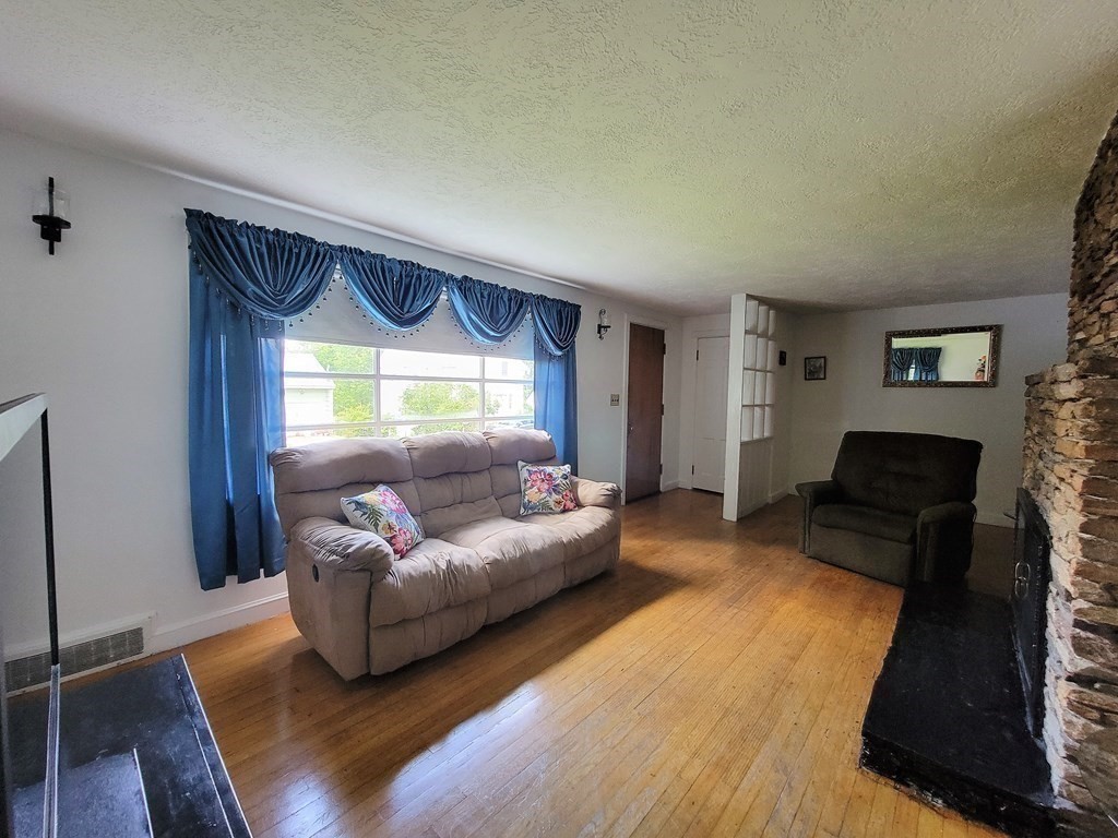 52 Ella Street Athol, MA 01331 - Photo 8 of 23 a living room with furniture and a large window