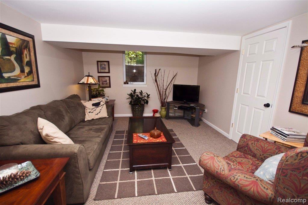 8925 Ridge Road Plymouth, MI 48170 - Photo 21 of 25 Basement Living Room.jpg