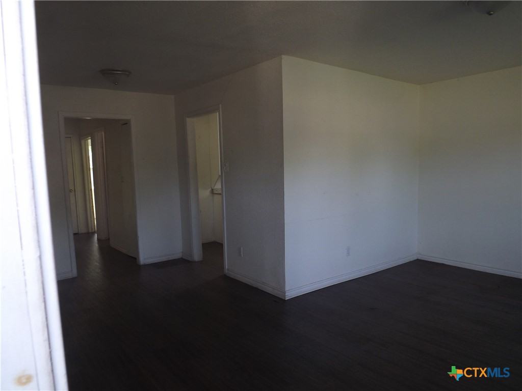 1714 Duncan Avenue Killeen, TX 76541 - Photo 5 of 24 a view of a hallway with wooden floor