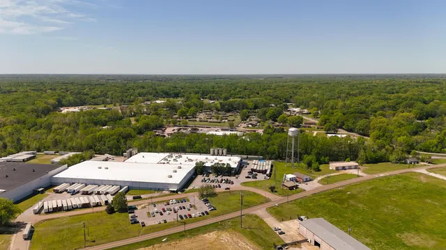 an aerial view of a house with a ocean view