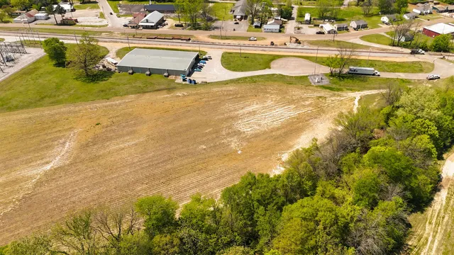 a view of a swimming pool with outdoor seating