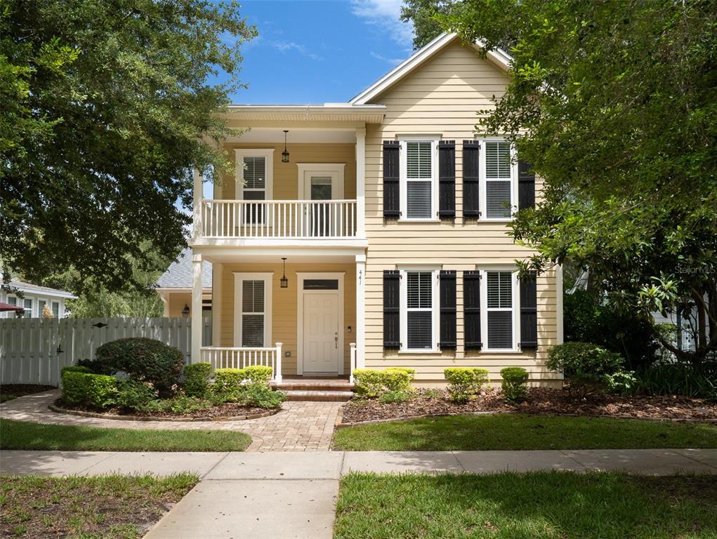 front view of a house with a yard