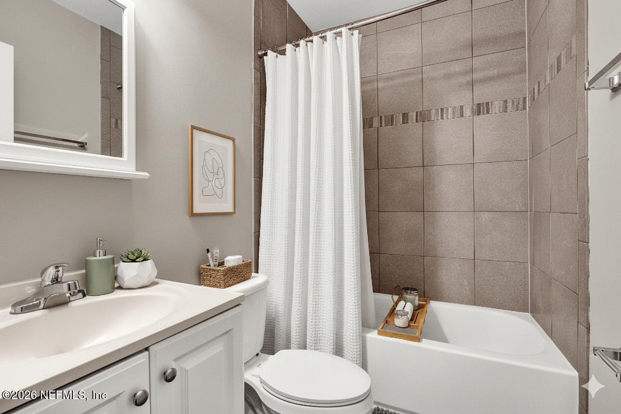 5456 Timuquana Road Jacksonville, FL 32210 - Photo 6 of 27 a bathroom with a sink toilet and shower