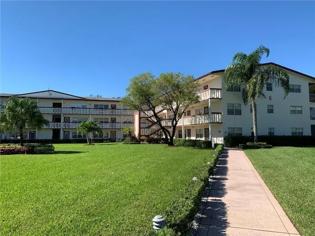 a front view of house with yard