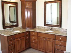 155 Sink Farm Road Mooresville, NC 28115 - Photo 12 of 16 a bathroom with a granite countertop double vanity sink and mirror