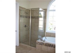155 Sink Farm Road Mooresville, NC 28115 - Photo 14 of 16 a bathroom with a tub shower and window