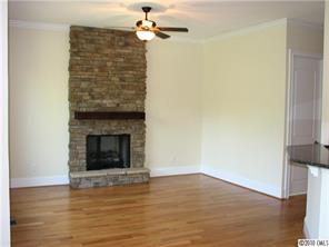 155 Sink Farm Road Mooresville, NC 28115 - Photo 9 of 16 a view of a livingroom with a fireplace