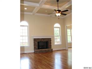155 Sink Farm Road Mooresville, NC 28115 - Photo 10 of 16 a view of a livingroom with a fireplace and window