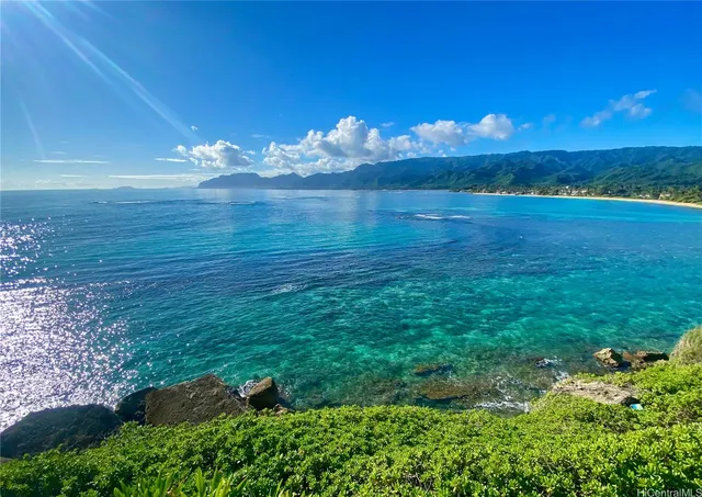 a view of a lake with a big yard