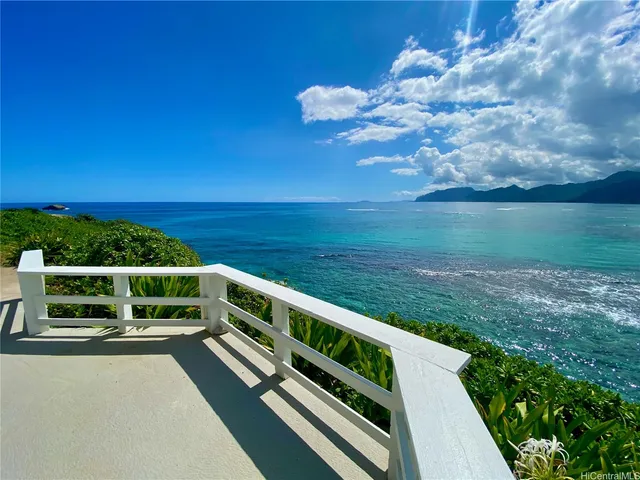a view of a balcony with lake view