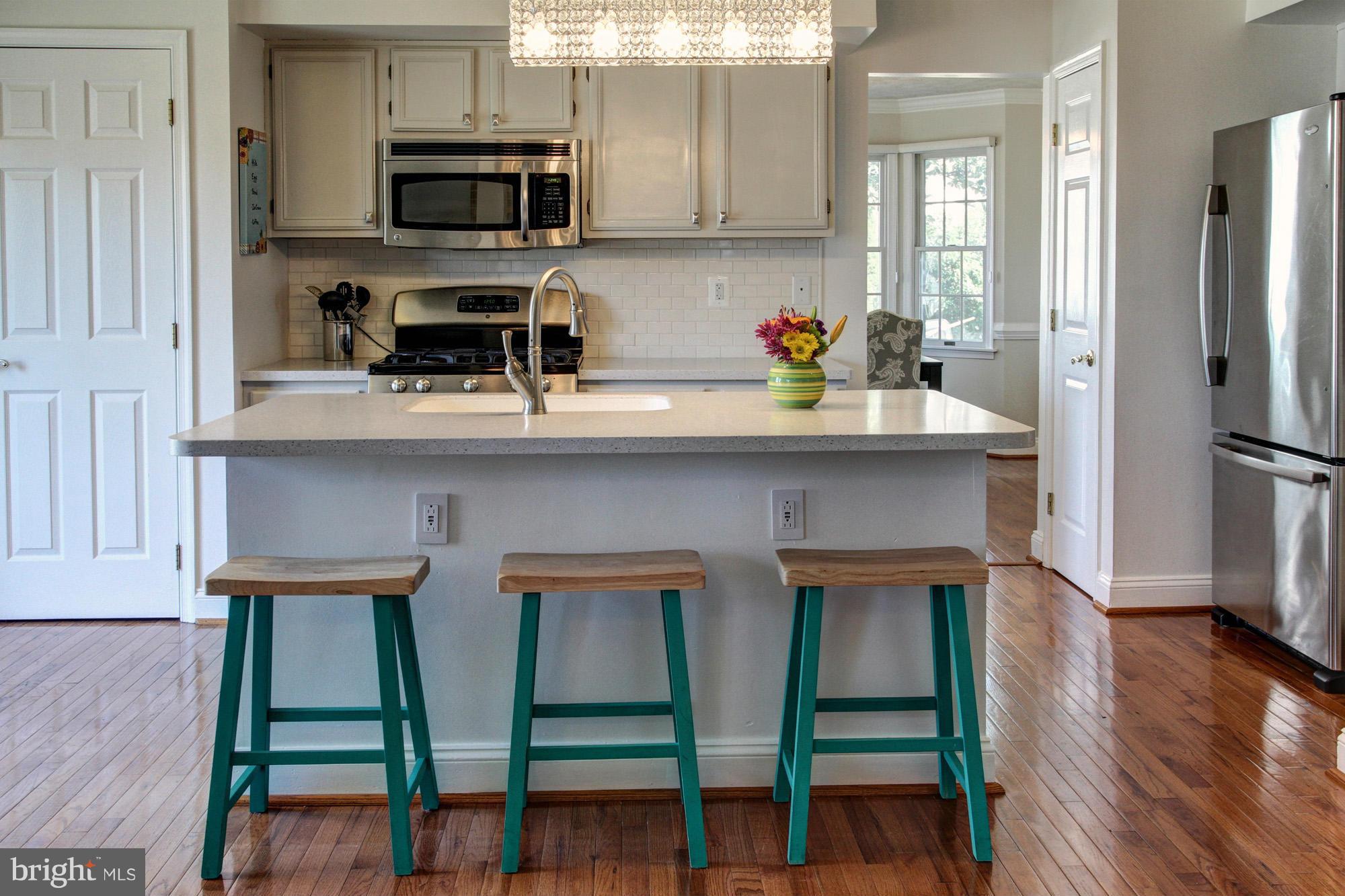 2306 Golden Chapel Road Odenton, MD 21113 - Photo 8 of 30 kitchen has loads of storage & eyecatching island