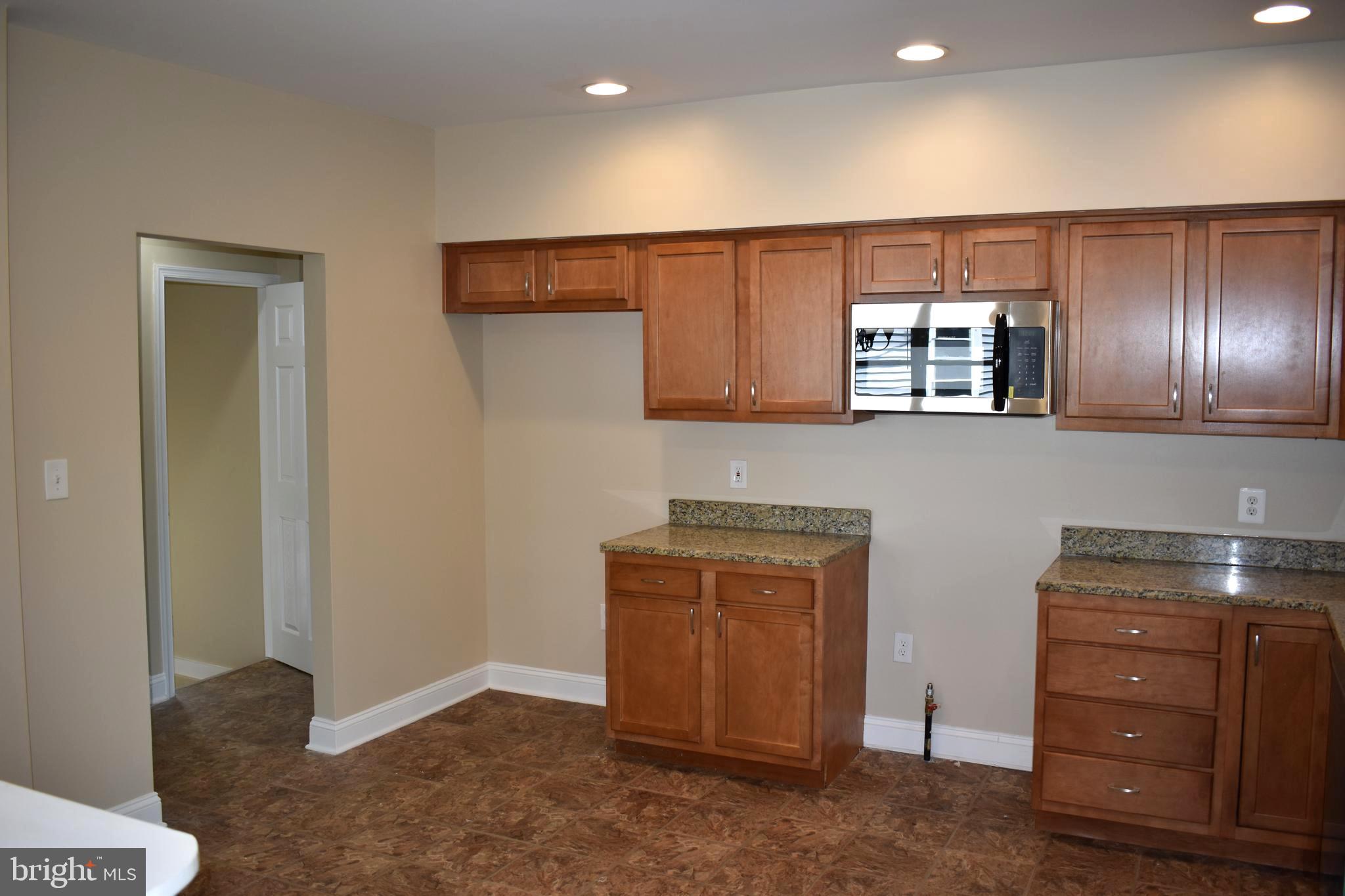 4211 Moravia Road Baltimore, MD 21206 - Photo 7 of 31 New SS Stove and Refrigerator To Be Installed