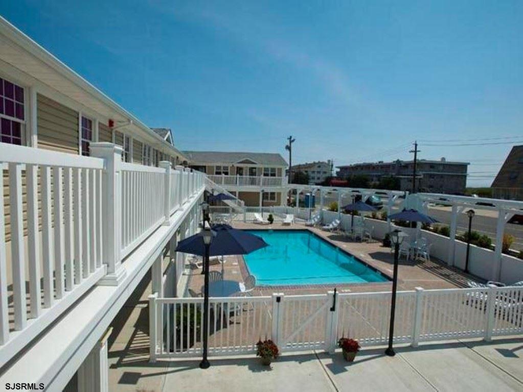 107 East Brigantine Avenue, Unit 211 Brigantine, NJ 08203 - Photo 30 of 34 a view of a balcony with furniture