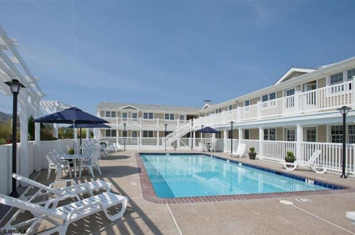 107 East Brigantine Avenue, Unit 211 Brigantine, NJ 08203 - Photo 32 of 34 a view of a house with pool and sitting area