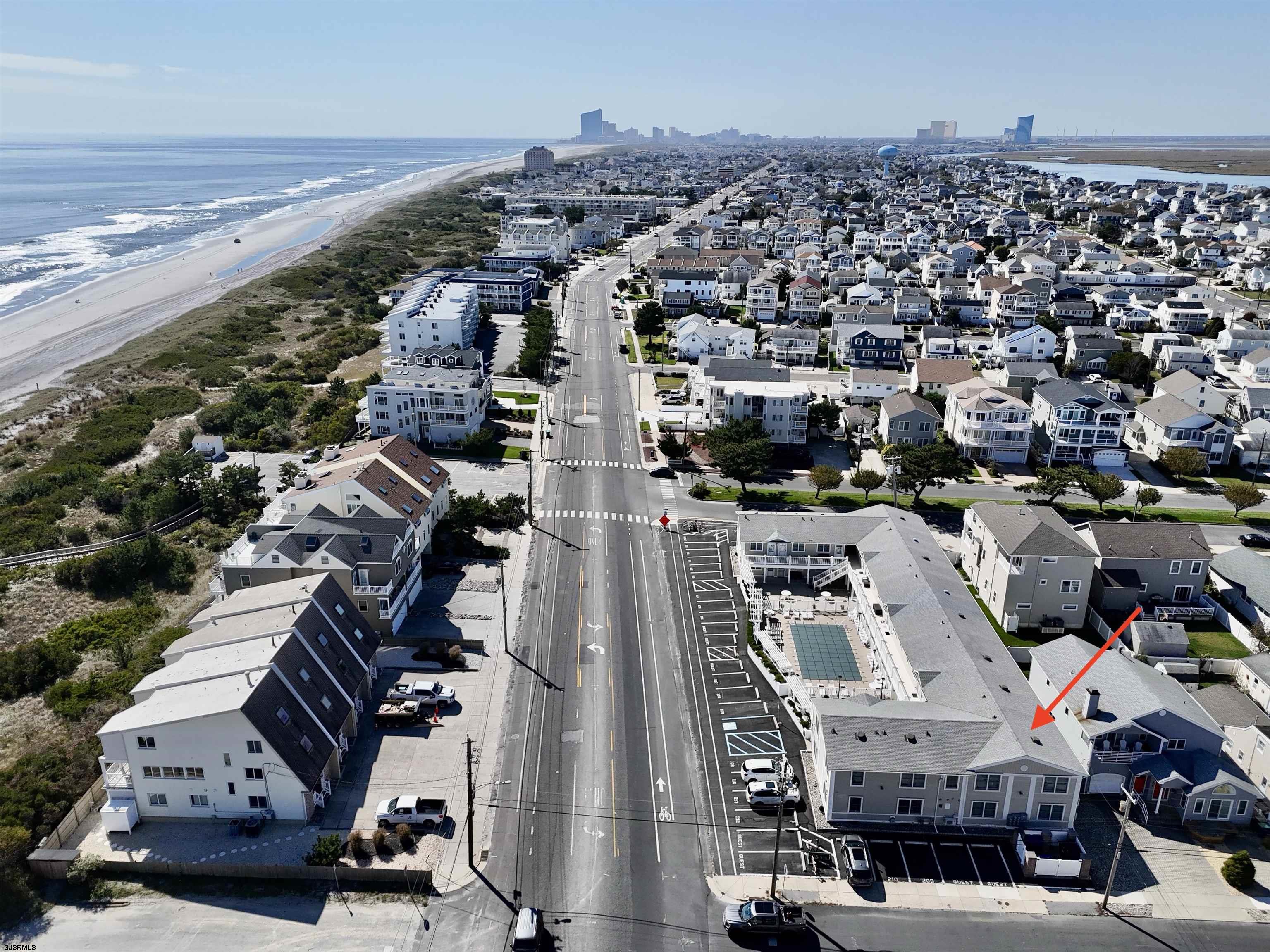 107 East Brigantine Avenue, Unit 211 Brigantine, NJ 08203 - Photo 4 of 34 an aerial view of a city