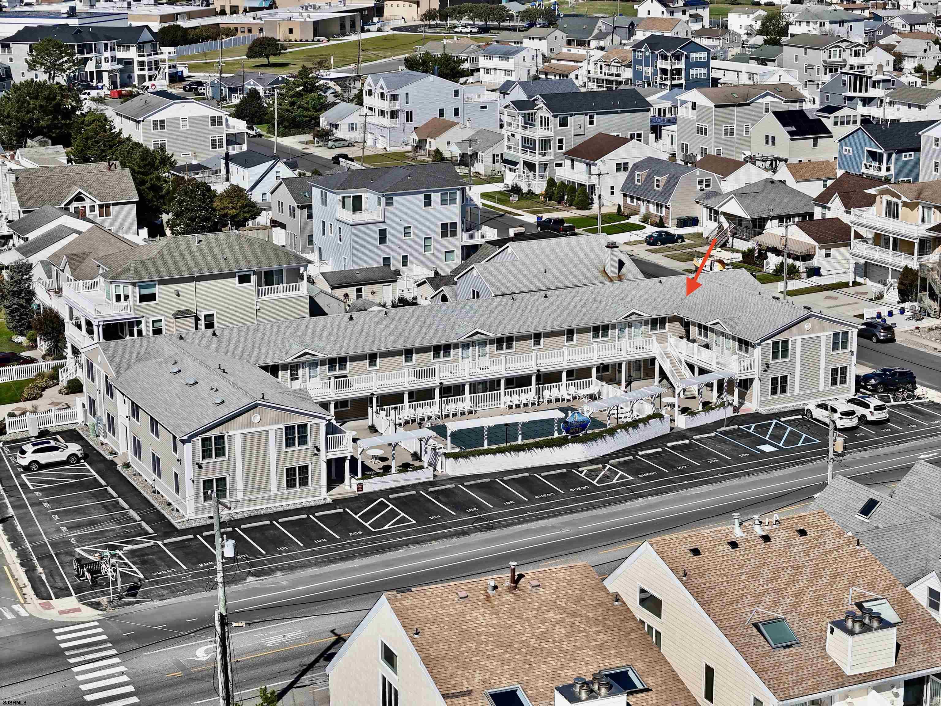 107 East Brigantine Avenue, Unit 211 Brigantine, NJ 08203 - Photo 9 of 34 an aerial view of a large building