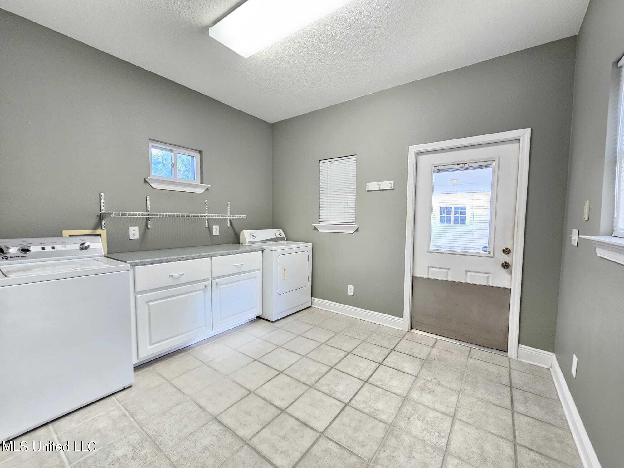 4319 Adcock Street Moss Point, MS 39563 - Photo 17 of 46 large laundry room
