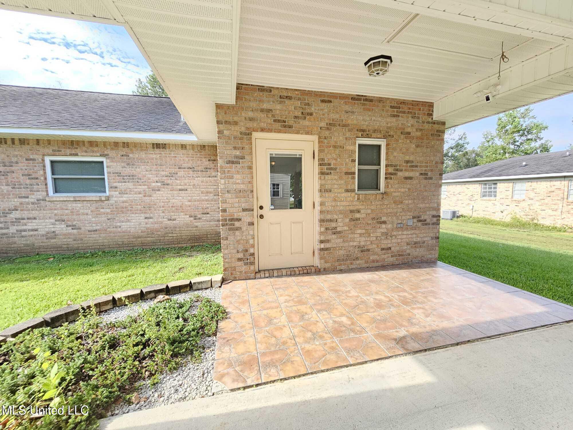 4319 Adcock Street Moss Point, MS 39563 - Photo 31 of 46 conected carport