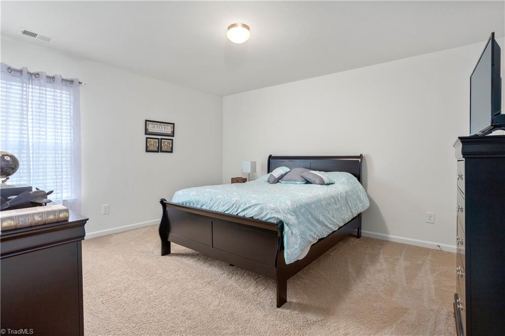 6414 Bentbrush Street Rural Hall, NC 27045 - Photo 28 of 42 Spacious 2nd bedroom with smaller walk in closet