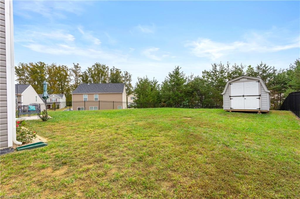 6414 Bentbrush Street Rural Hall, NC 27045 - Photo 36 of 42 Spacious fenced in back yard perfect for pets.