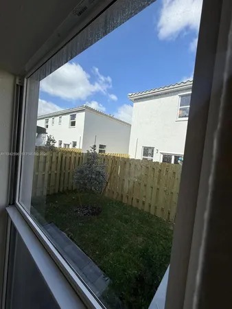 a bathroom with a double vanity sink toilet and mirror