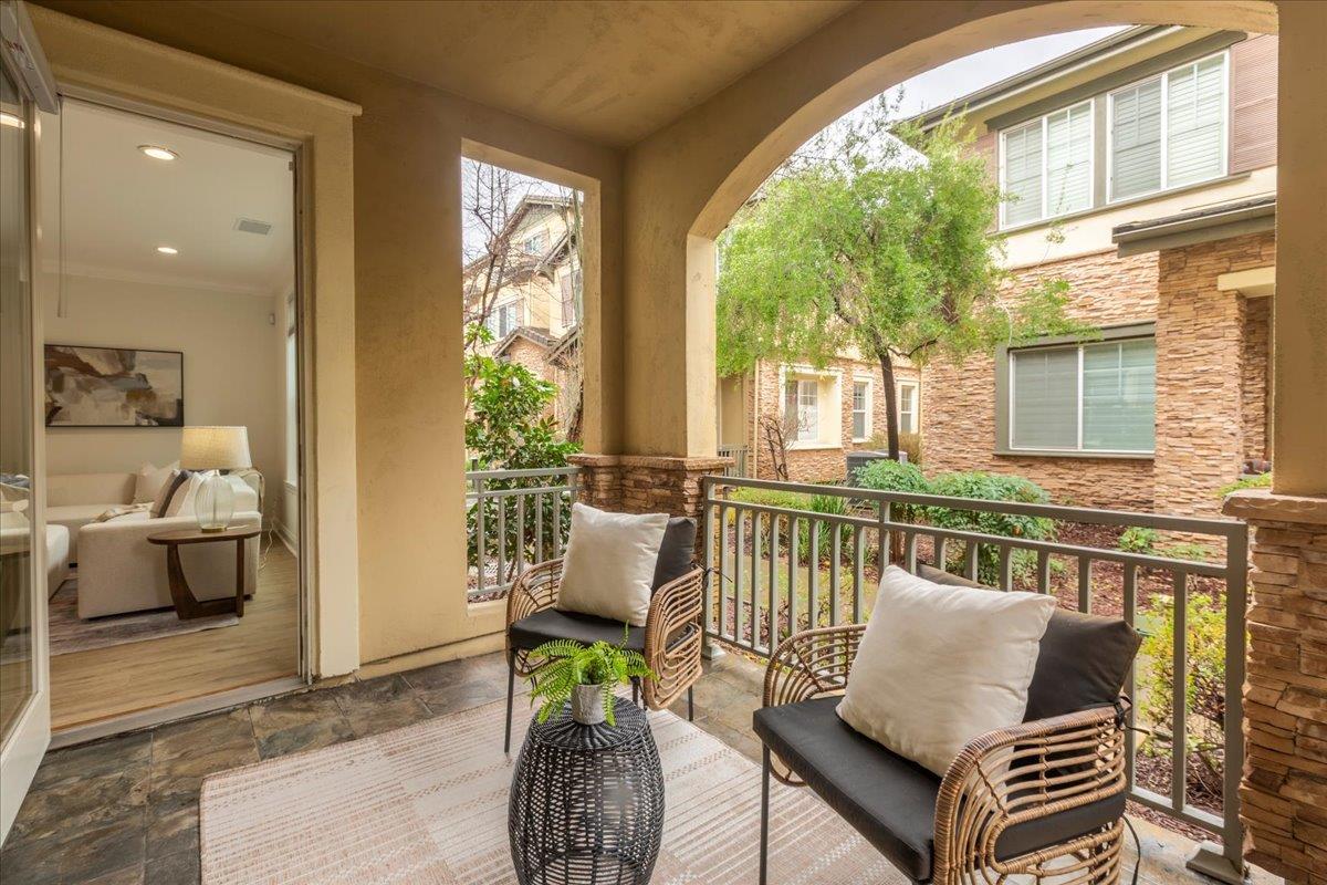 2881 Meridian Avenue, Unit 108 San Jose, CA 95124 - Photo 20 of 41 a balcony with couch and wooden floor