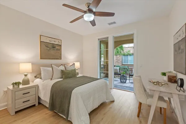 a bedroom with bed and window
