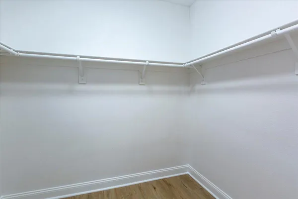 a view of a hallway with washer and dryer