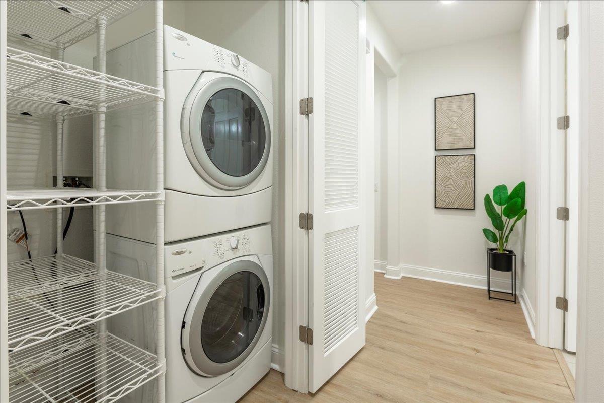 2881 Meridian Avenue, Unit 108 San Jose, CA 95124 - Photo 29 of 41 a view of a hallway with washer and dryer
