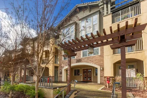 a front view of a building with street view