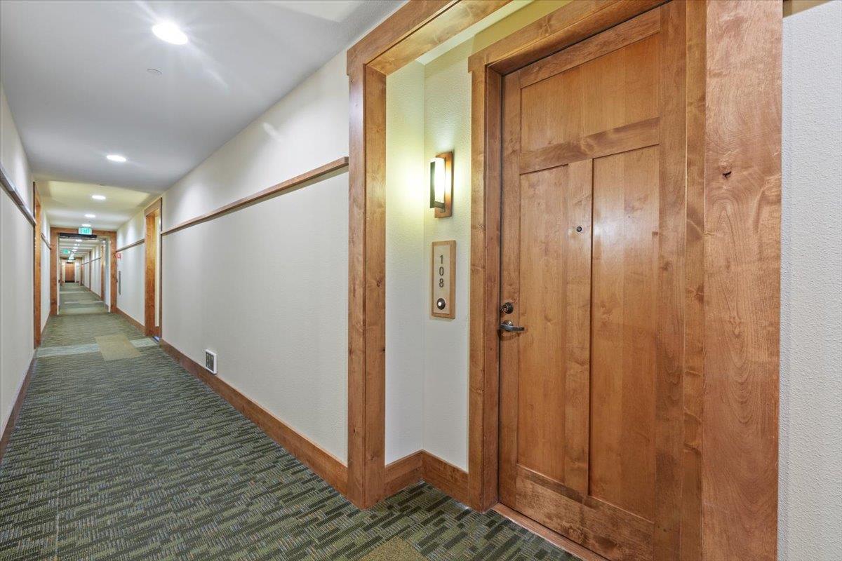 2881 Meridian Avenue, Unit 108 San Jose, CA 95124 - Photo 5 of 41 a view of a hallway with wooden floor
