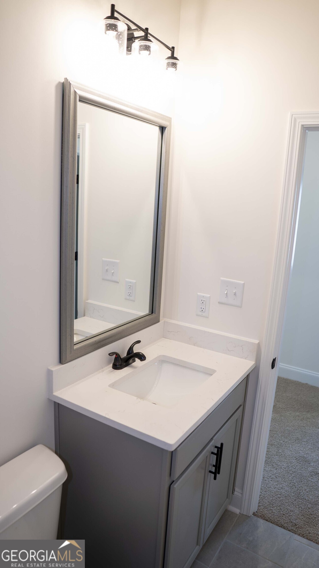 604 Beaver Court Perry, GA 31069 - Photo 34 of 40 a bathroom with a sink and a toilet