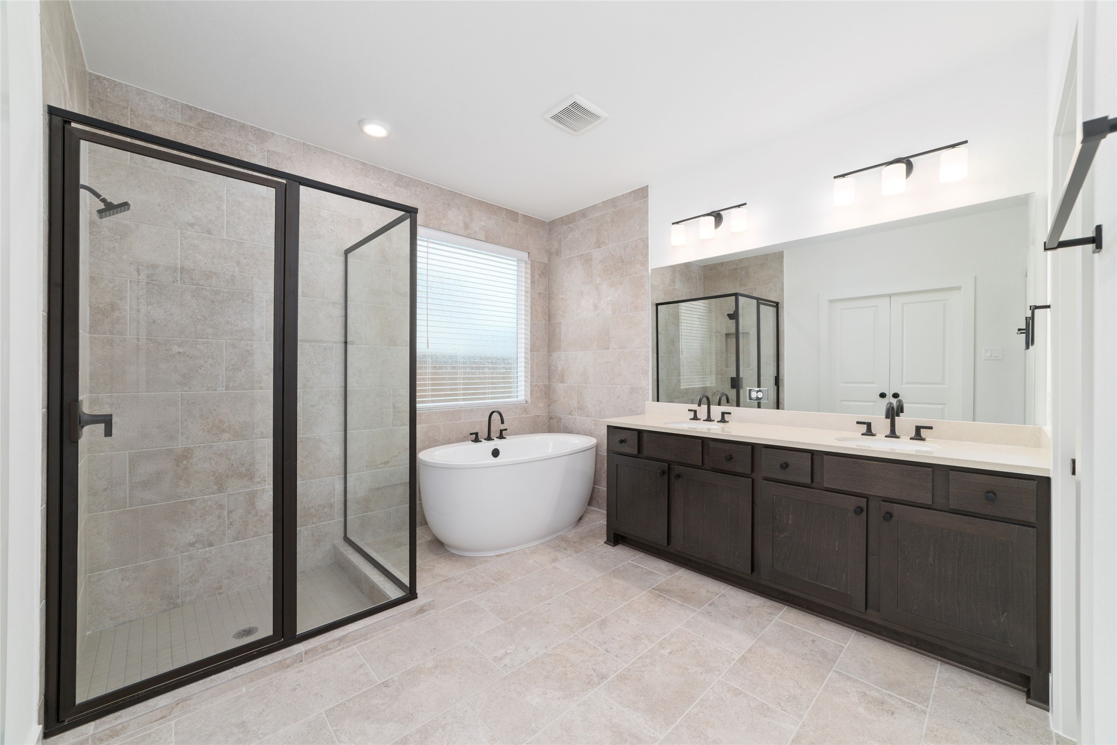5177 Enchanted Pne Court Spring, TX 77386 - Photo 17 of 29 Primary Bath with soaking tub, separate shower and dual sinks