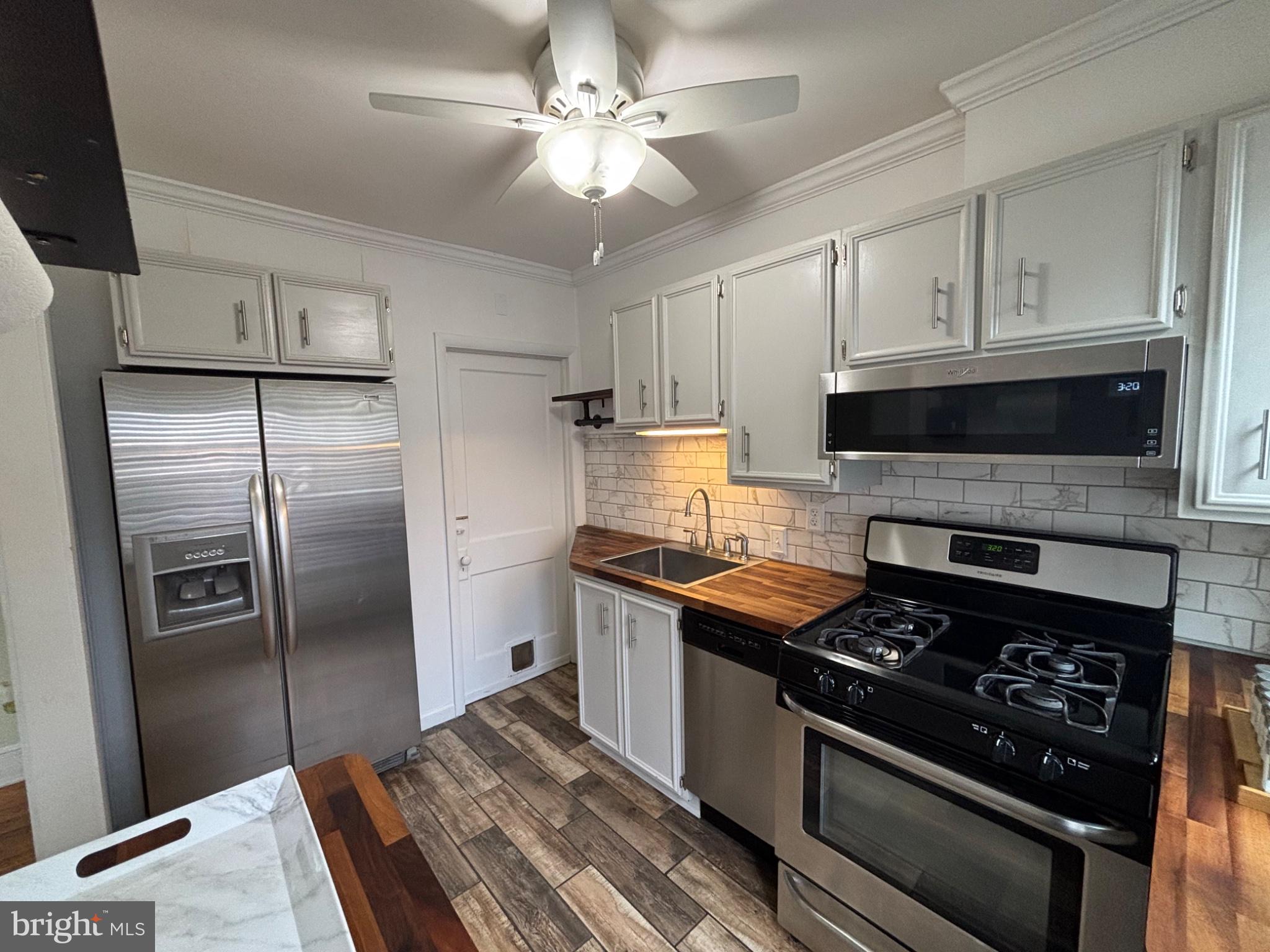 4101 Vernon Road Drexel Hill, PA 19026 - Photo 9 of 26 Modern kitchen with sleek finishes.