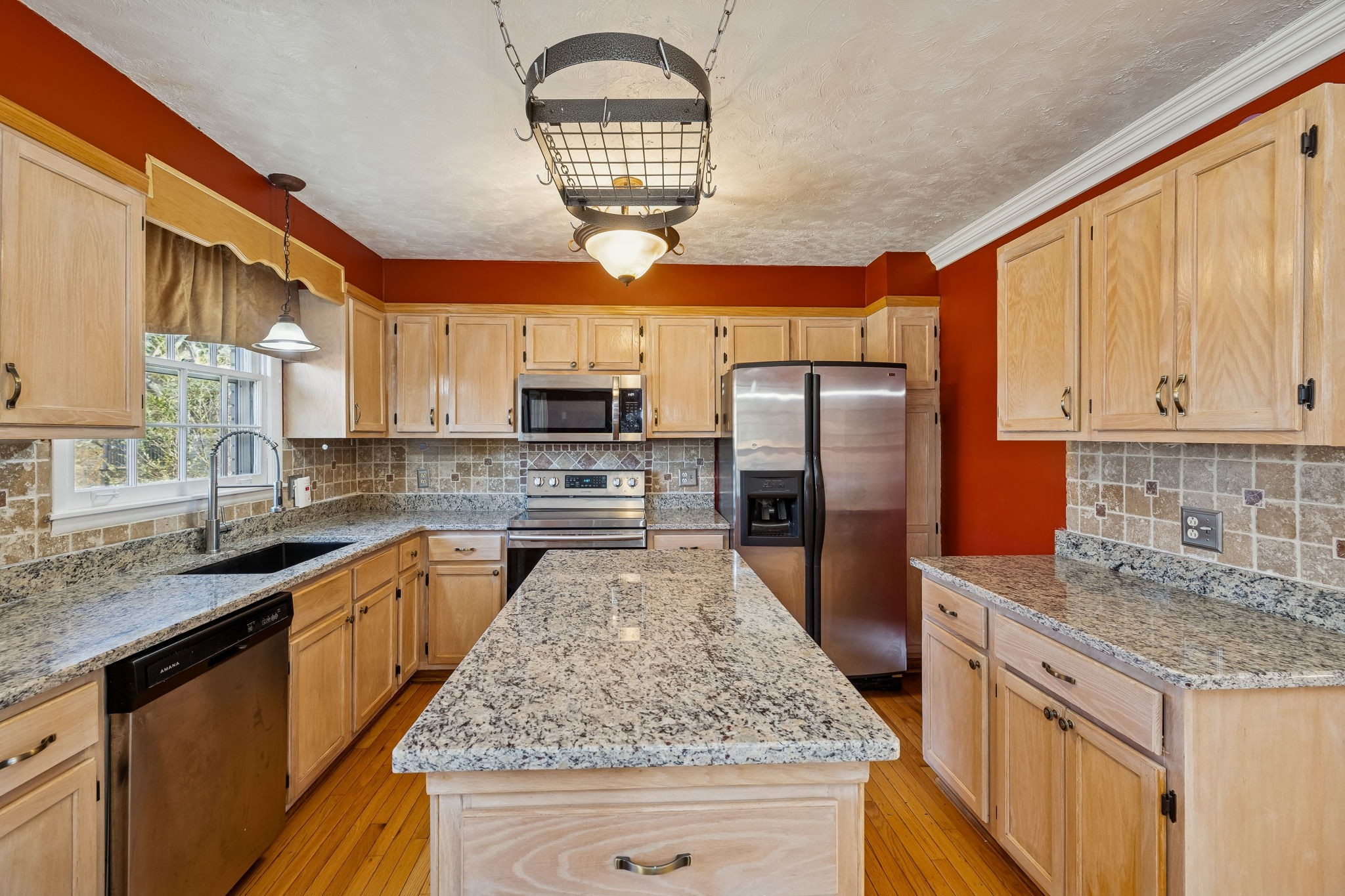 7424 George Gaines Road Nashville, TN 37221 - Photo 11 of 60 a kitchen with stainless steel appliances granite countertop a sink stove and refrigerator