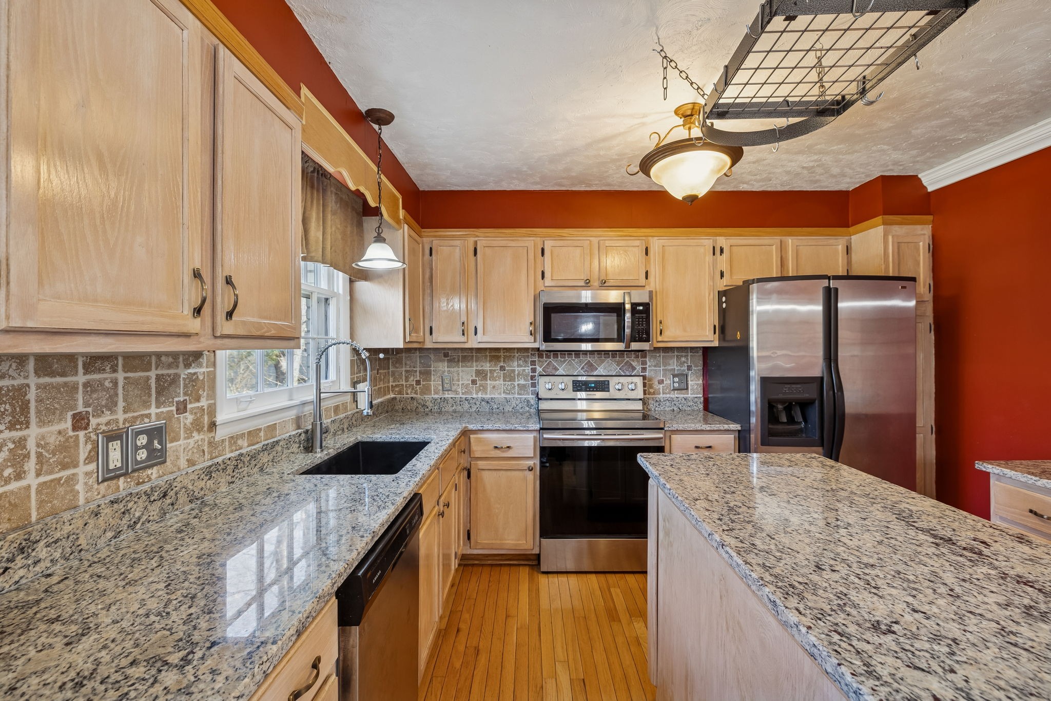 7424 George Gaines Road Nashville, TN 37221 - Photo 13 of 60 a kitchen with stainless steel appliances granite countertop a sink a stove and cabinets