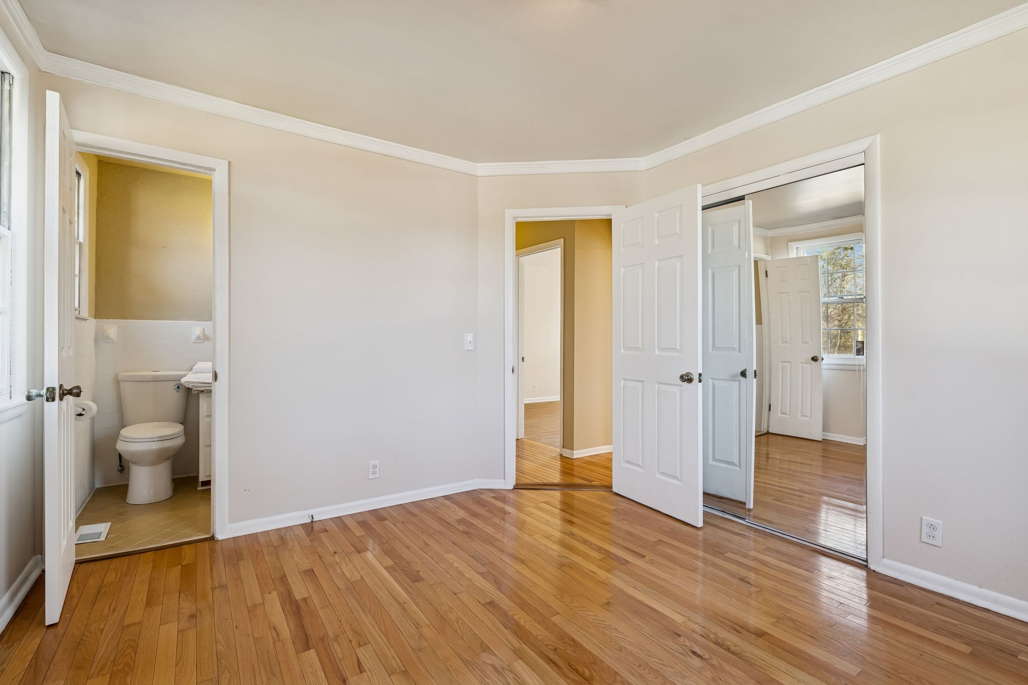 7424 George Gaines Road Nashville, TN 37221 - Photo 17 of 60 a view of a room with wooden floor and a bathroom