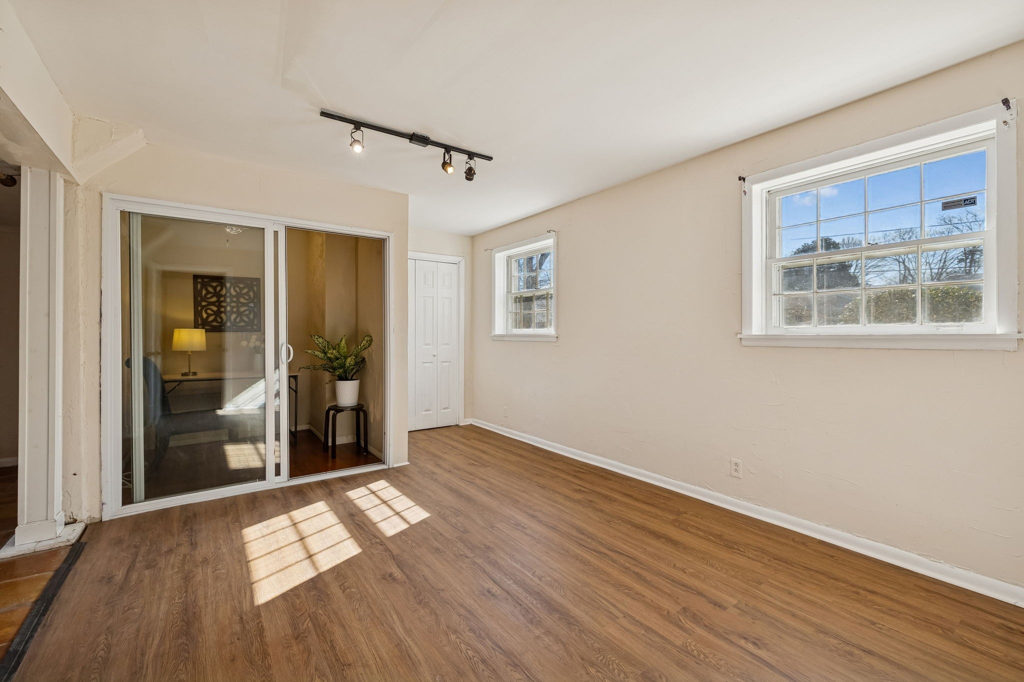 7424 George Gaines Road Nashville, TN 37221 - Photo 25 of 60 a view of empty room with wooden floor and fan