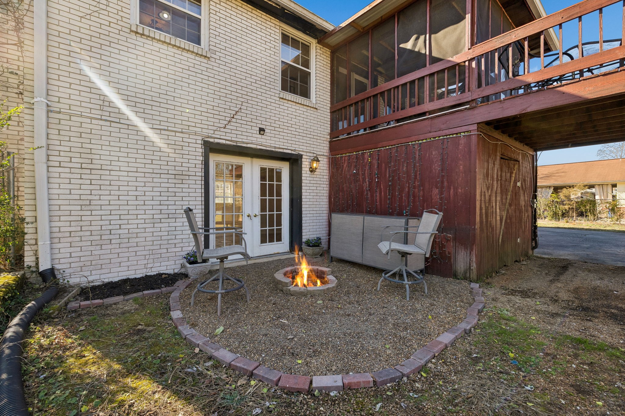 7424 George Gaines Road Nashville, TN 37221 - Photo 39 of 60 a backyard of a house with outdoor seating