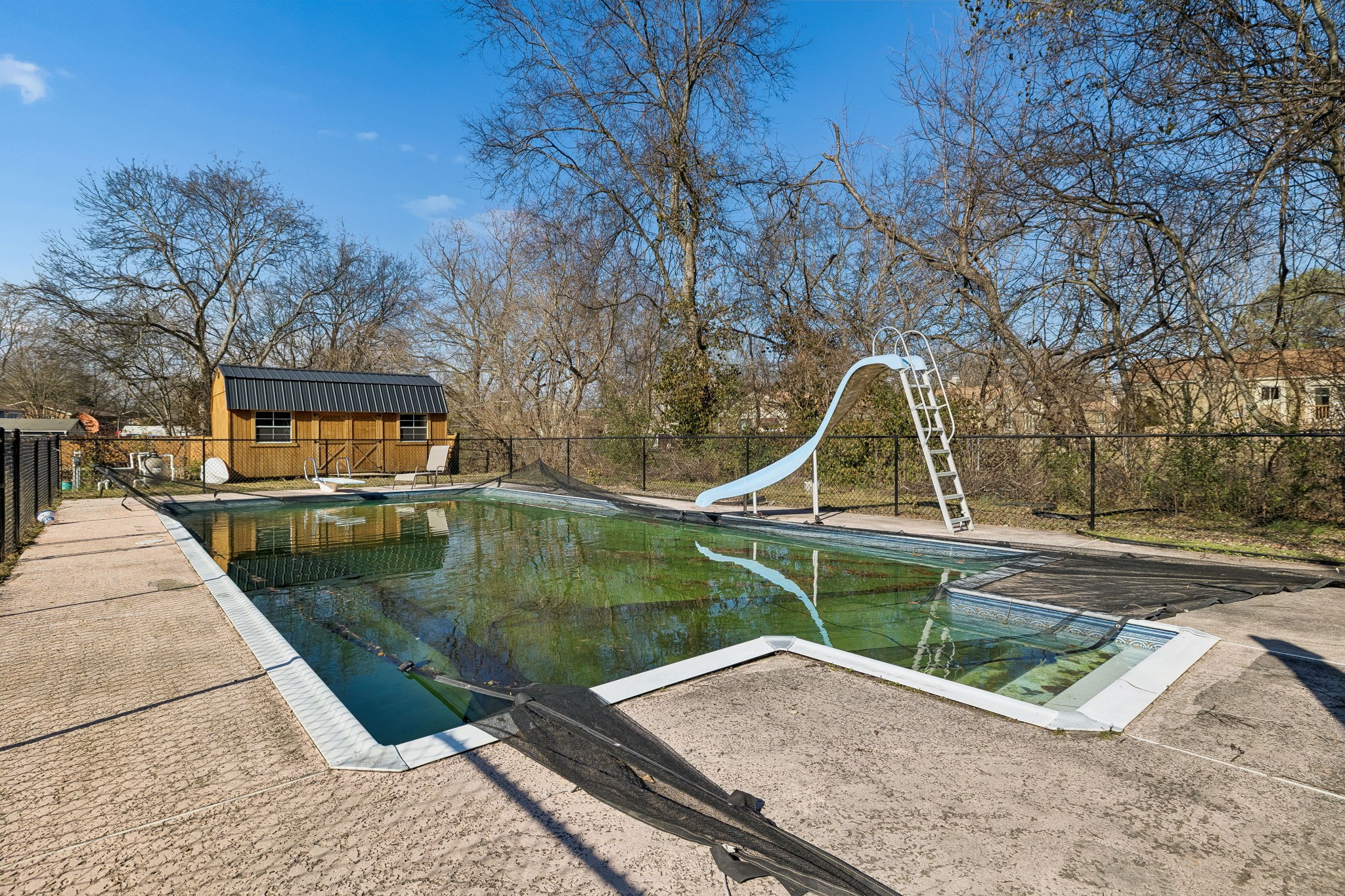 7424 George Gaines Road Nashville, TN 37221 - Photo 46 of 60 a view of a swimming pool with a patio