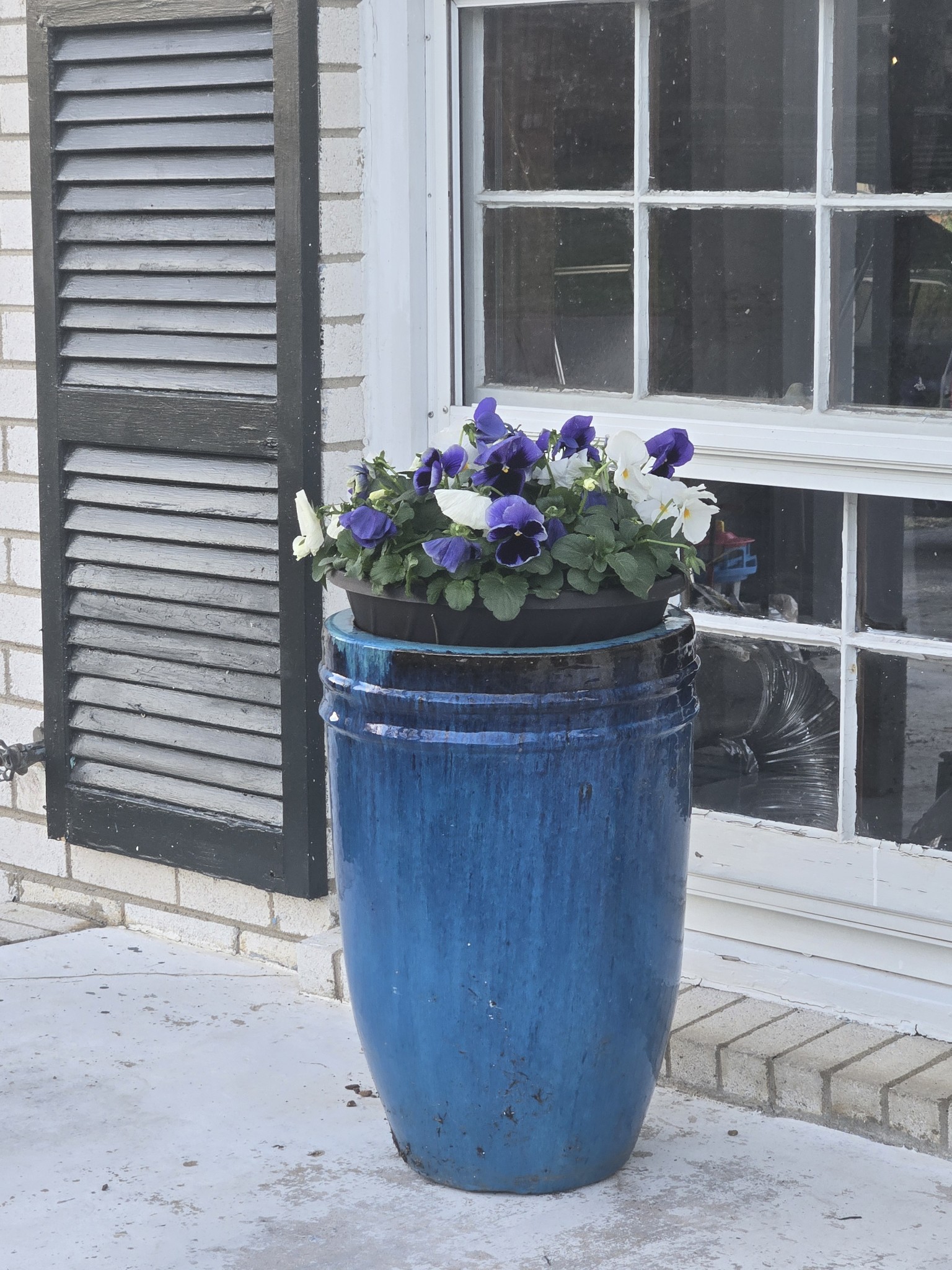 7424 George Gaines Road Nashville, TN 37221 - Photo 49 of 60 a wooden bench sitting in front of a house