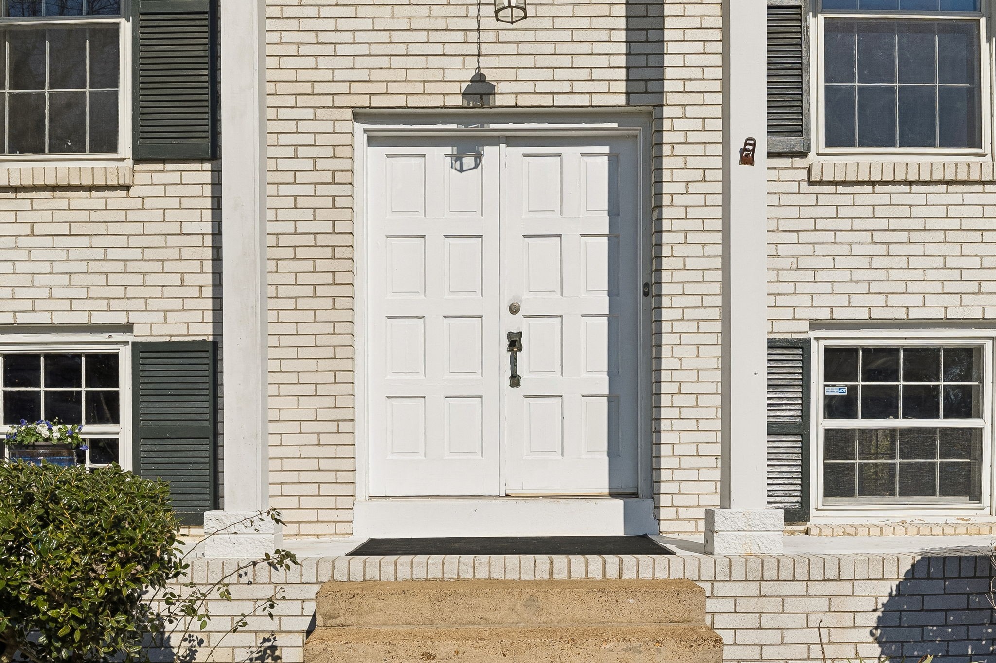 7424 George Gaines Road Nashville, TN 37221 - Photo 5 of 60 a view of a brick house with large windows