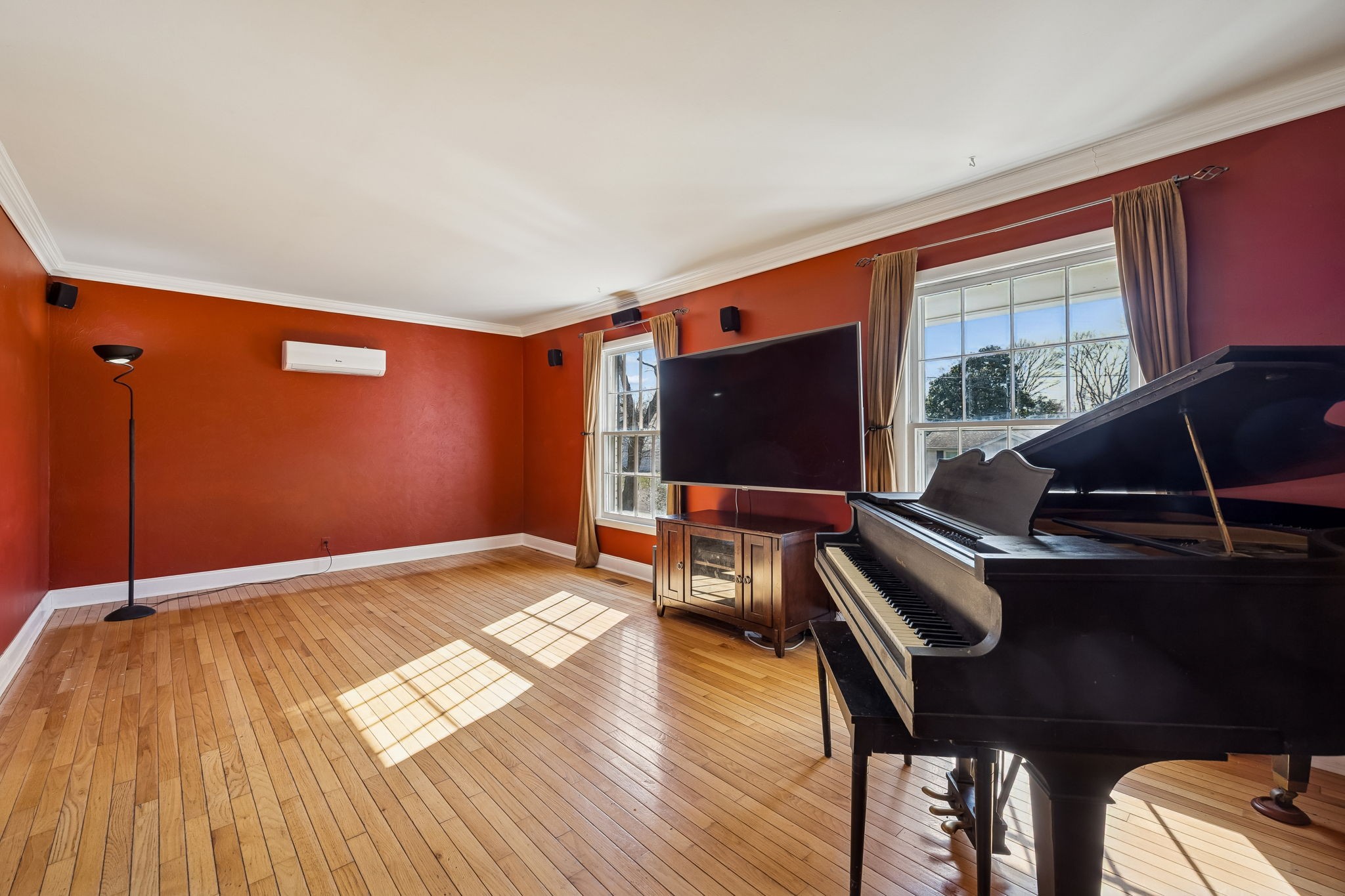 7424 George Gaines Road Nashville, TN 37221 - Photo 7 of 60 a living room with furniture and a flat screen tv
