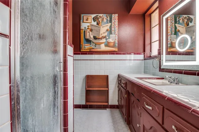 a bathroom with a sink and a toilet