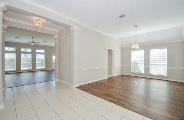 a view of an empty room and window