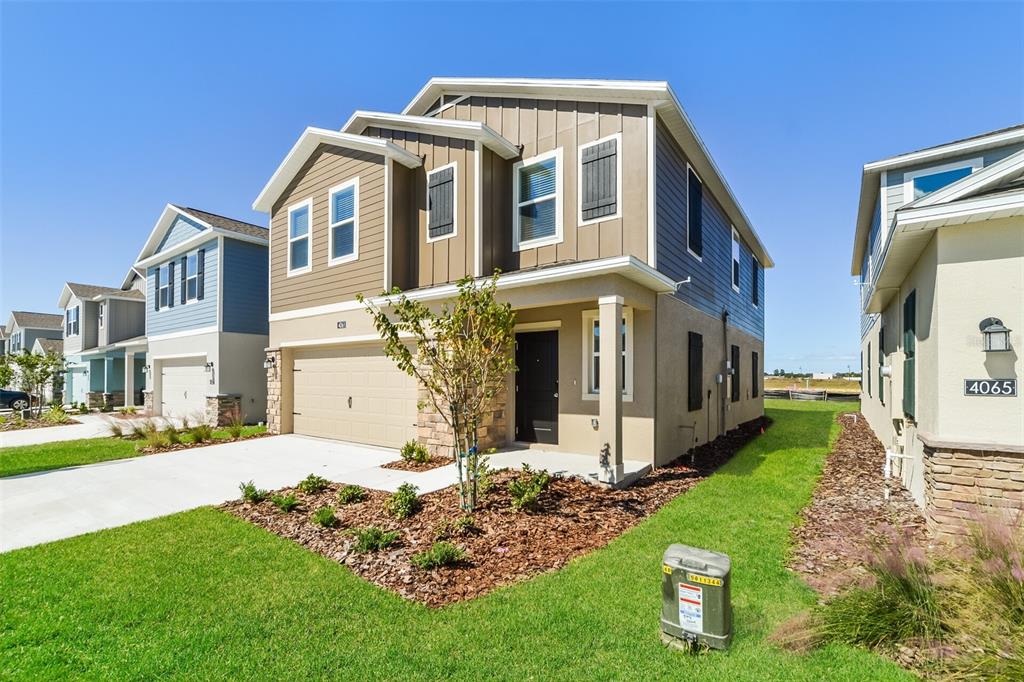 4061 Old Ml Road Haines City, FL 33844 - Photo 15 of 15 a front view of a house with a yard