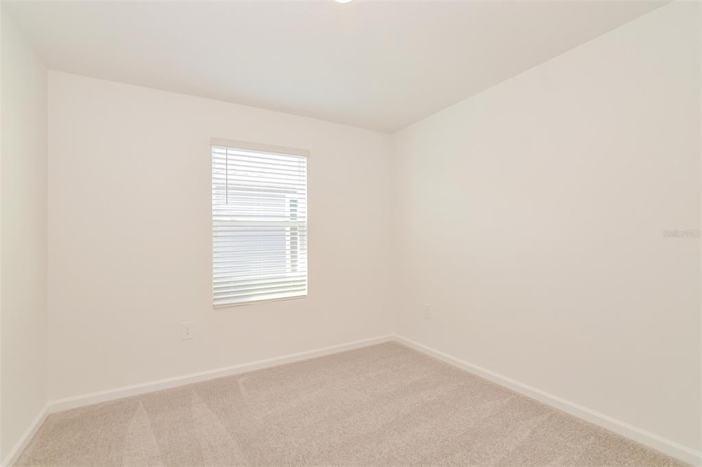 4061 Old Ml Road Haines City, FL 33844 - Photo 2 of 15 an empty room with a window