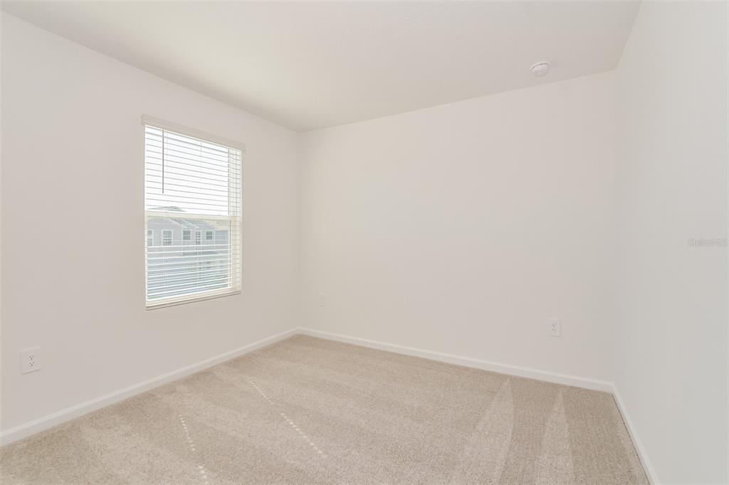 4061 Old Ml Road Haines City, FL 33844 - Photo 3 of 15 an empty room with a window