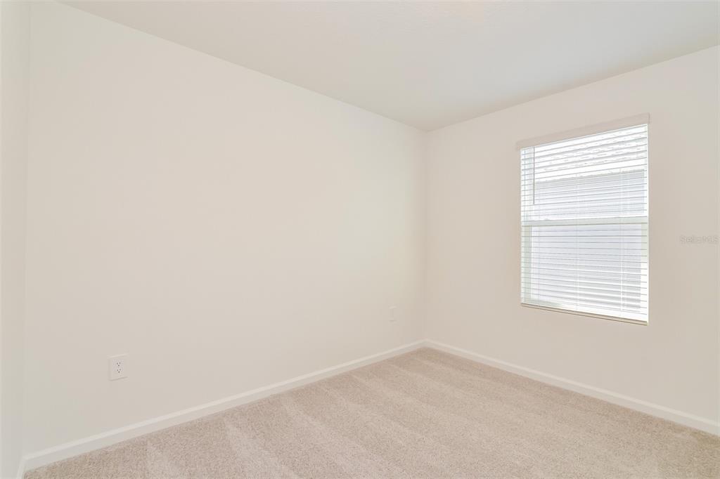 4061 Old Ml Road Haines City, FL 33844 - Photo 6 of 15 an empty room with a window