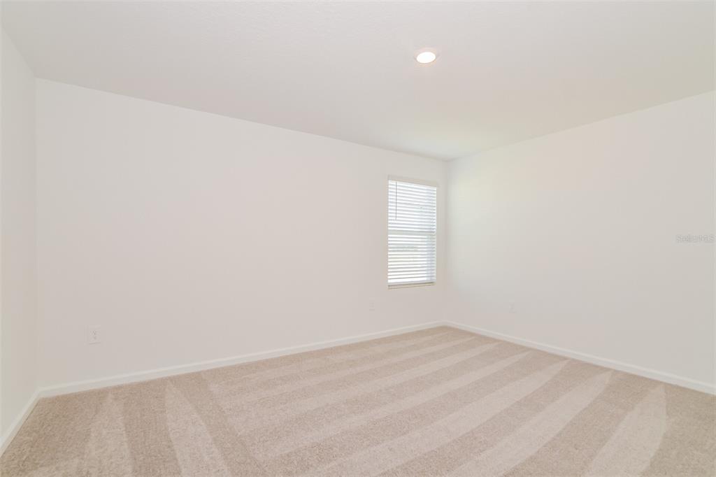 4061 Old Ml Road Haines City, FL 33844 - Photo 9 of 15 an empty room with a window